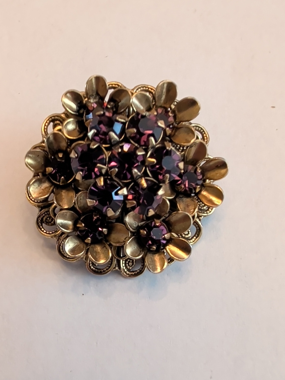 Vintage Gold Tone Floral Brooch with Purple Rhinestones